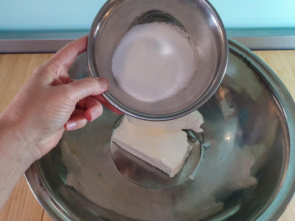 Feijoa cheesecake 9 Adding sugar to cream cheese.
