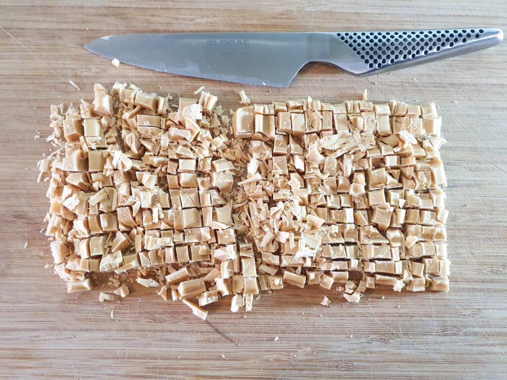 Chopping chocolate.