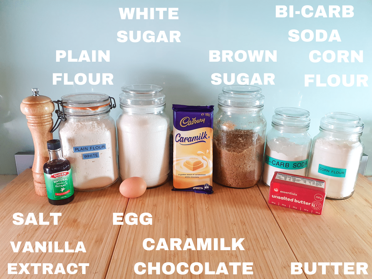 Caramilk cookies ingredients, salt, vanilla extract, plain white flour, white sugar, egg, caramilk chocolate, brown sugar, bicarb, unsalted butter, corn flour.