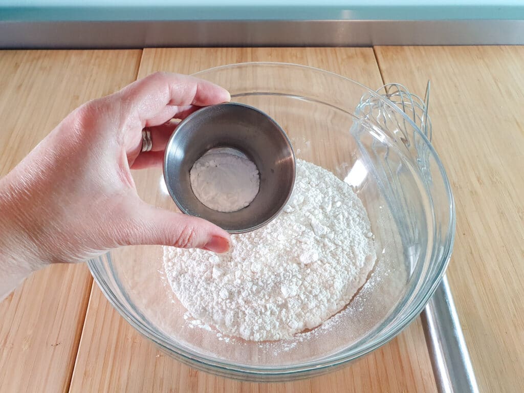 Caramilk cookies 5 Adding salt, corn flour and baking soda to flour.