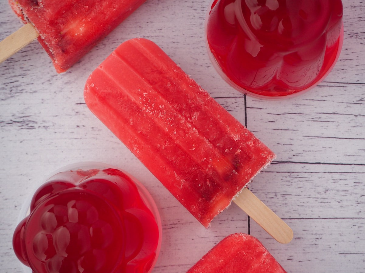 Jello popsicles 2 Strawberry jello popsicle with mini strawberry jello molds.