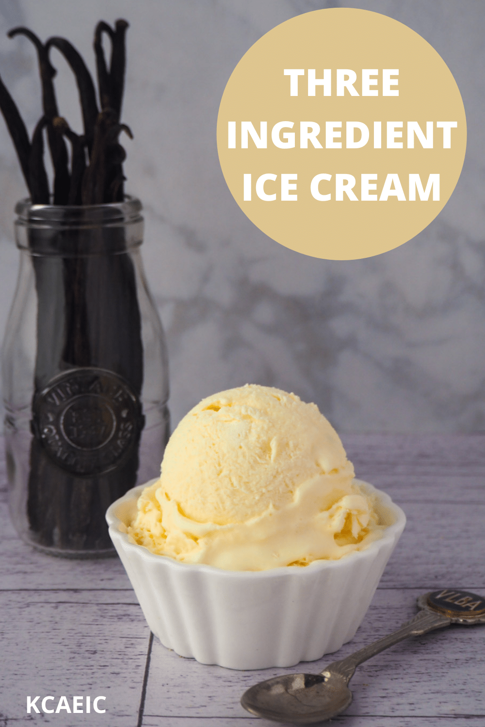 Scoop of ice cream with spoon and a jar of vanilla beans, with text overlay, three ingredient ice cream and KCAEIC.