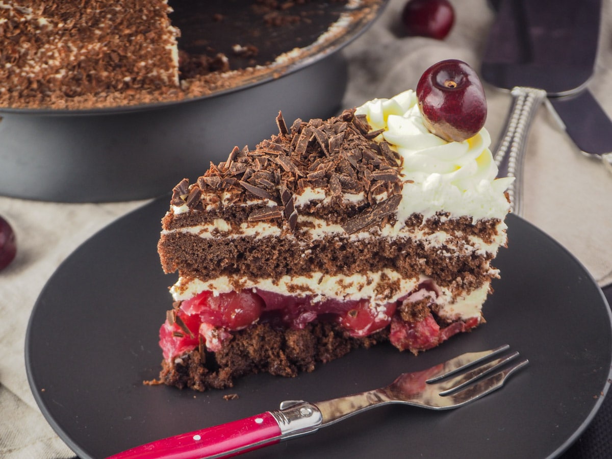 Traditional Black Forest Cake 36 Slice of cake with cake fork.