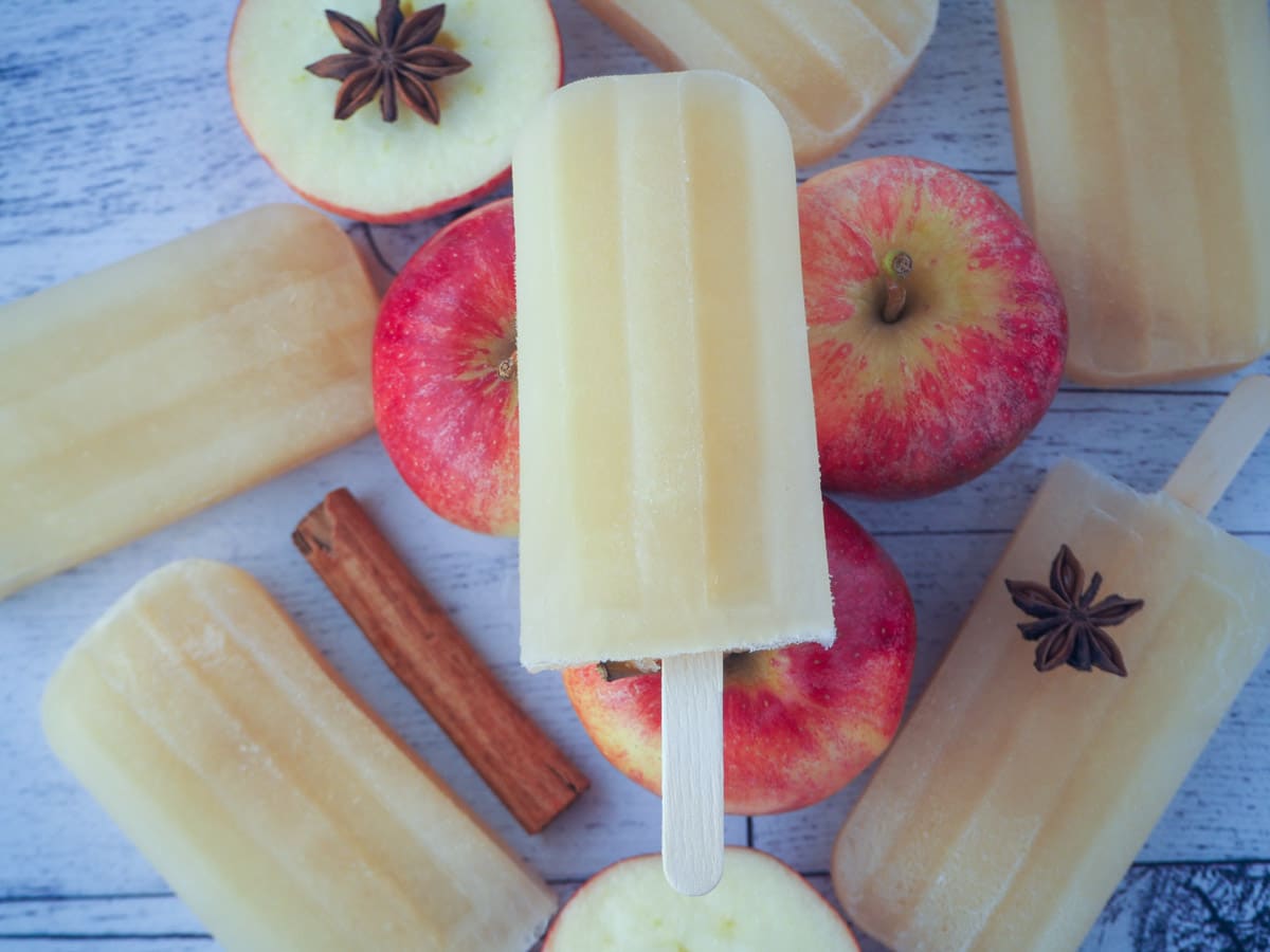 Mulled apple cider popsicles withy apples and spices.