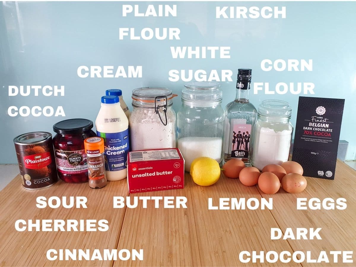 Traditional Black Forest Cake 4 Ingredients, Dutch coat powder, sour cherries, cinnamon, cream, plain four, butter, white sugar, lemon, kirsch, eggs, corn flour, dark chocolate.