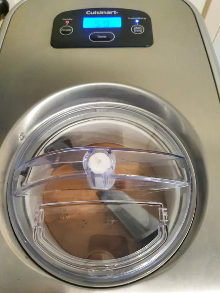 Black Forest Ice Cream 16 Churning chocolate ice cream.