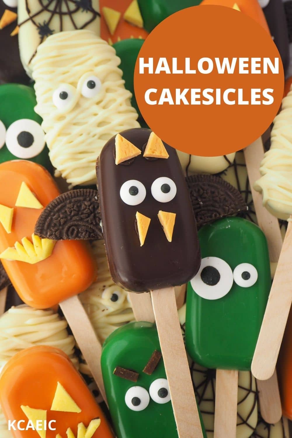 Pile of Mummy, bat, monster, jack-o-lantern and spider cakesicles with text overlay, Halloween cakesicles, KCAEIC.