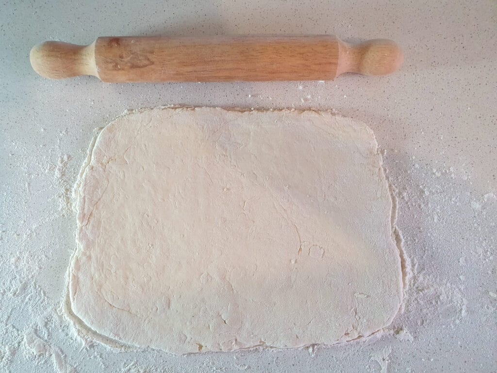 Biscoff Cinnamon Rolls 6 Dough rolled out to a rectangle.