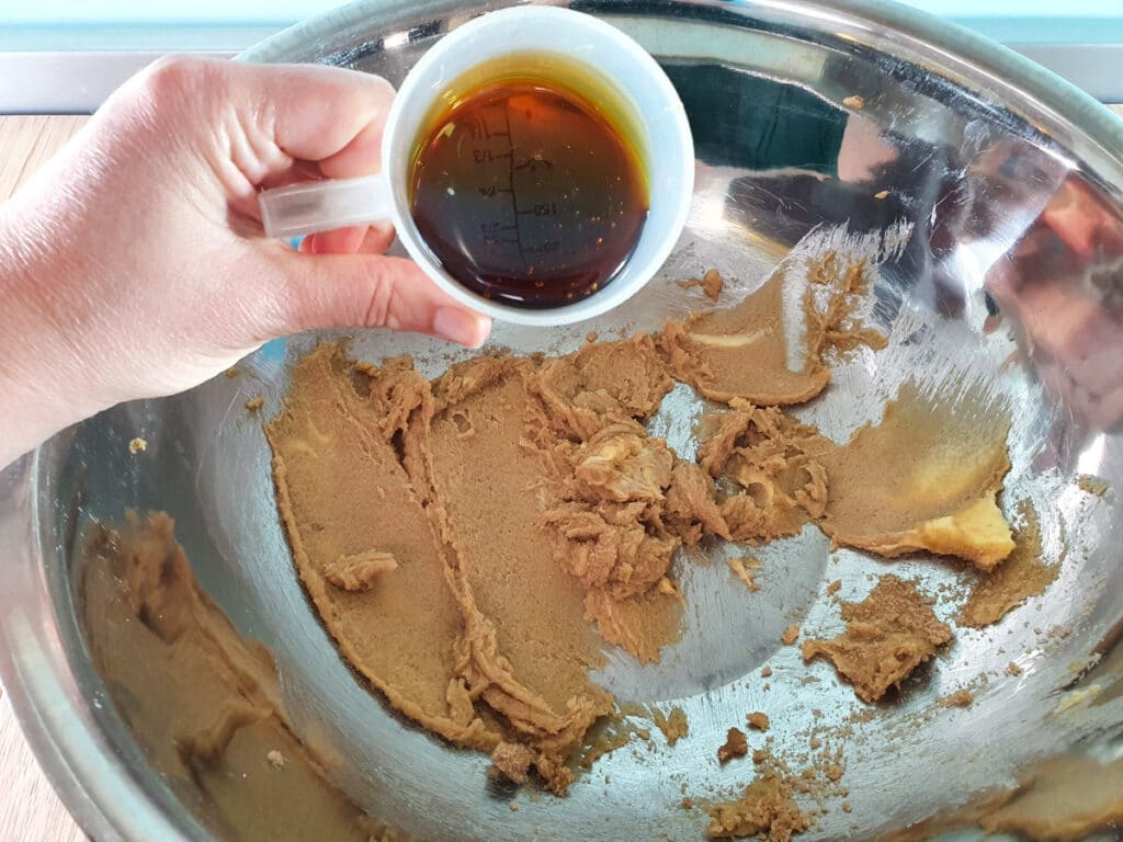 Adding golden syrup.