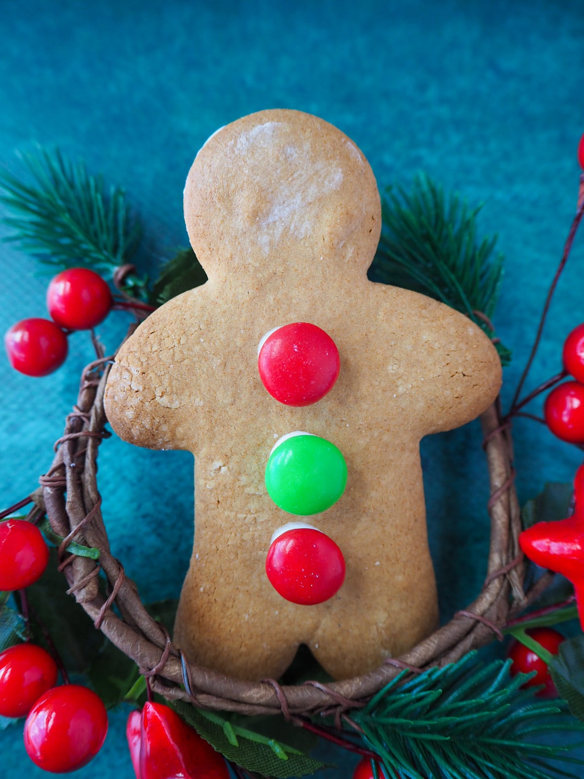 Gingerbread me on festive greenery.