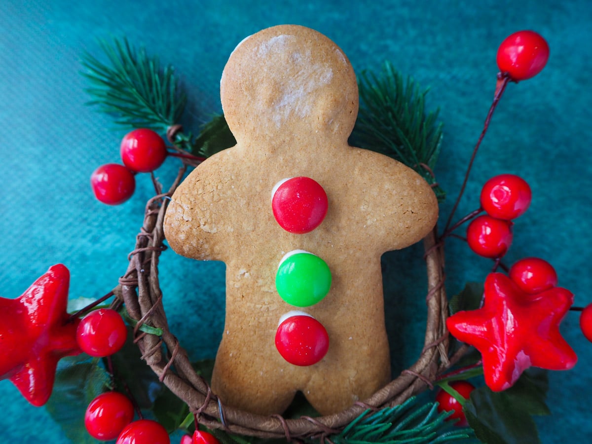 Gingerbread men with festive decorations.