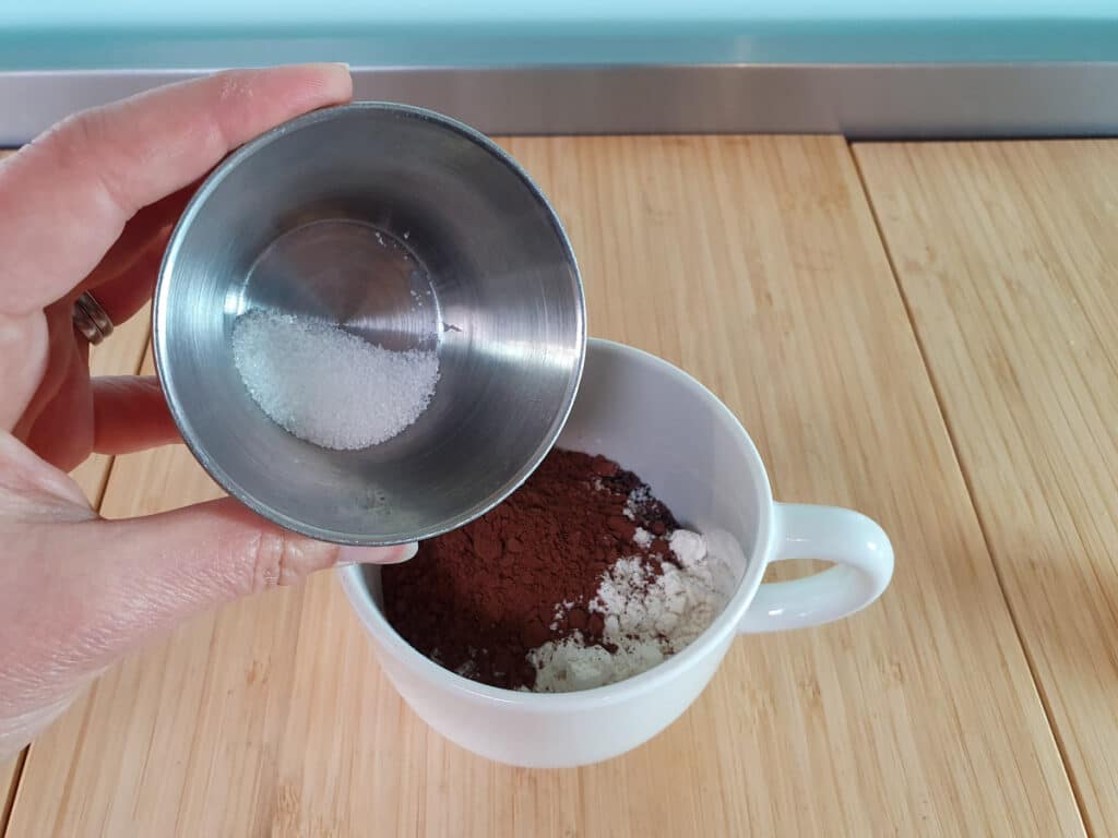 Oreo Mug Cake 8 Adding sugar.
