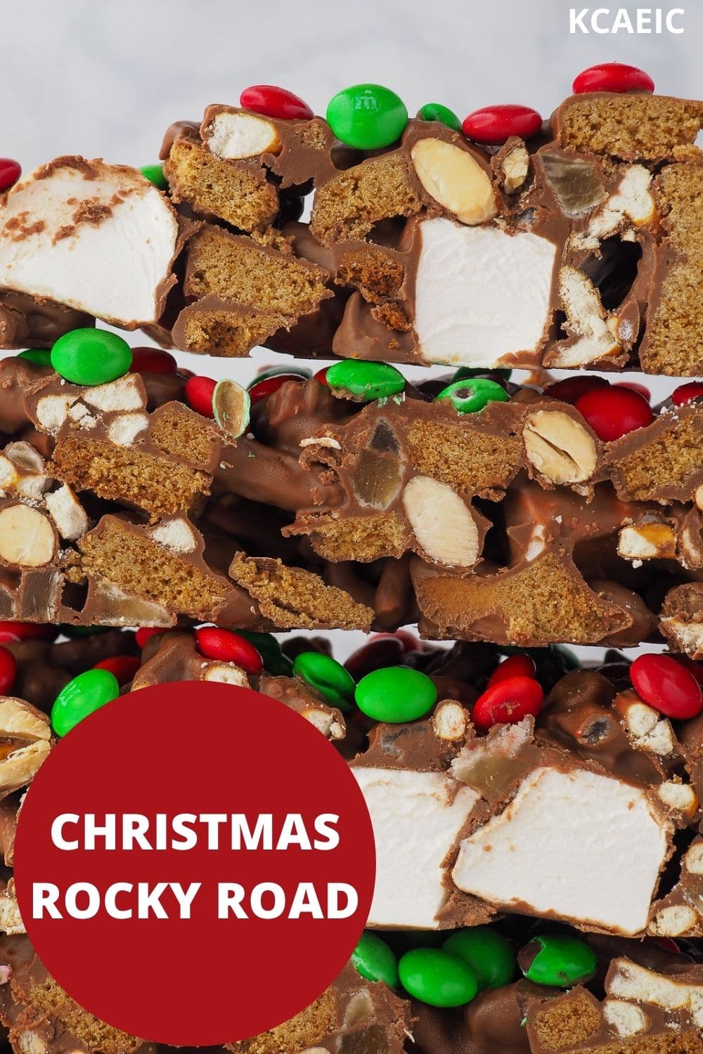Close up of a large stack of rocky road, with text overlay, Christmas Rocky Road and KCAEIC.