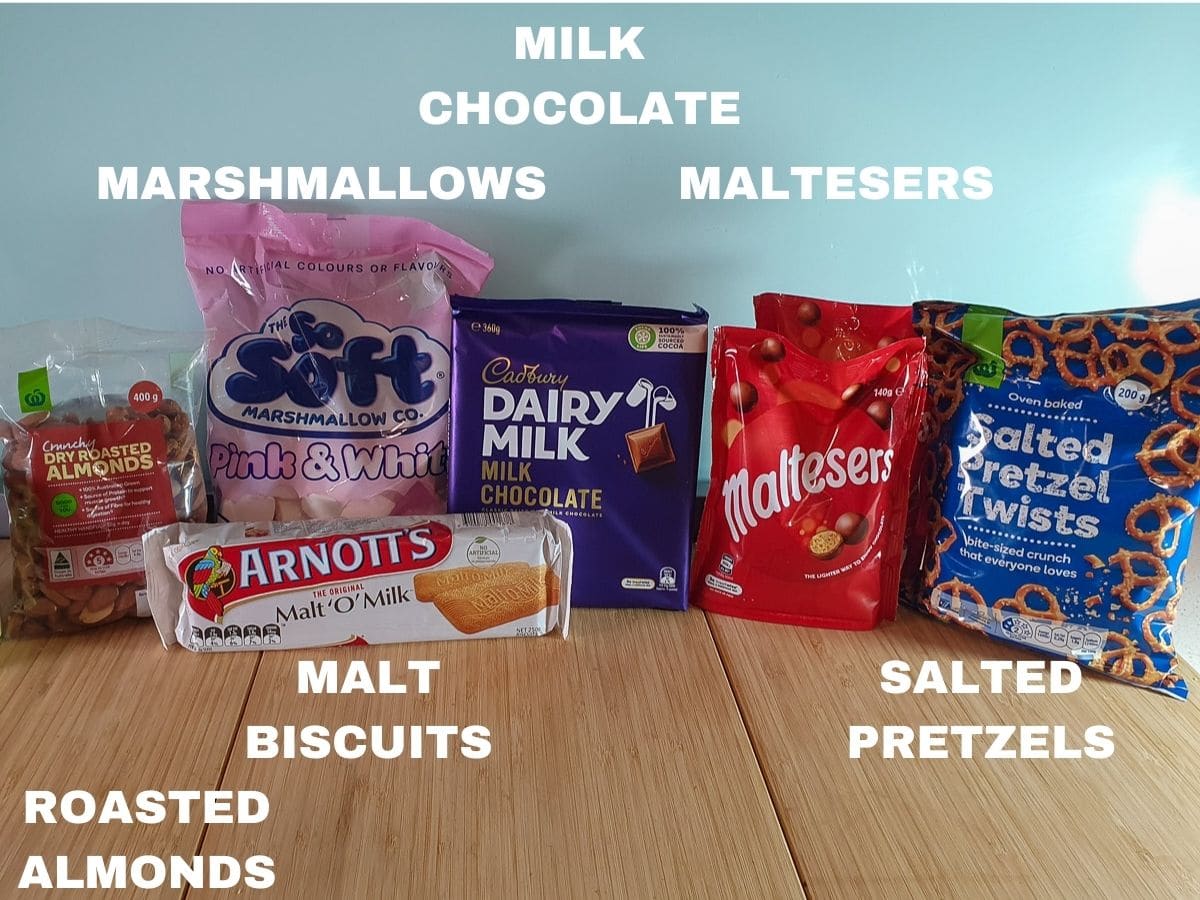 Ingredients: roasted almonds, marshmallows, malt biscuits, milk chocolate, Maltesers, salted pretzels.