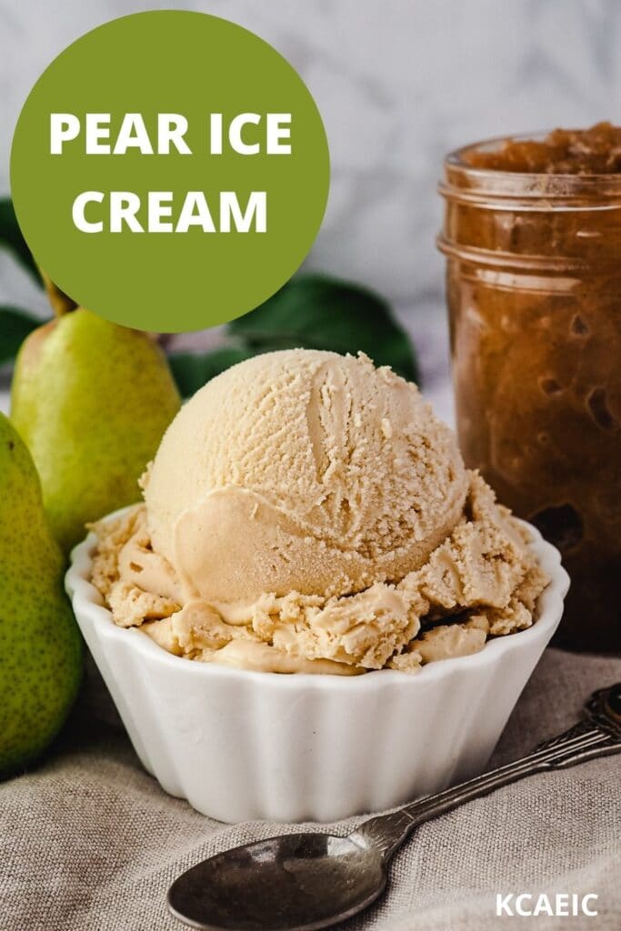 Scoop of pear ice cream with spoon, fresh pears and jar of pear compote on the side.
