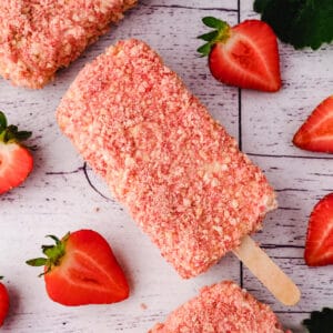Strawberry Shortcake Ice Cream 11 Ice cream bar with fresh strawberries and leaves.