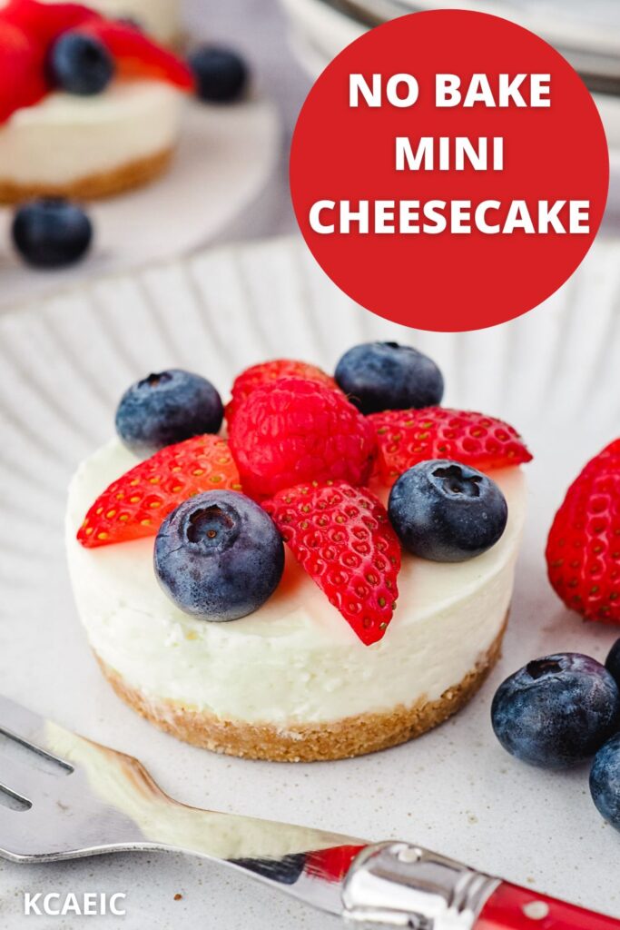 Cheesecake on a plate with fresh berries and a fork, with text overlay.