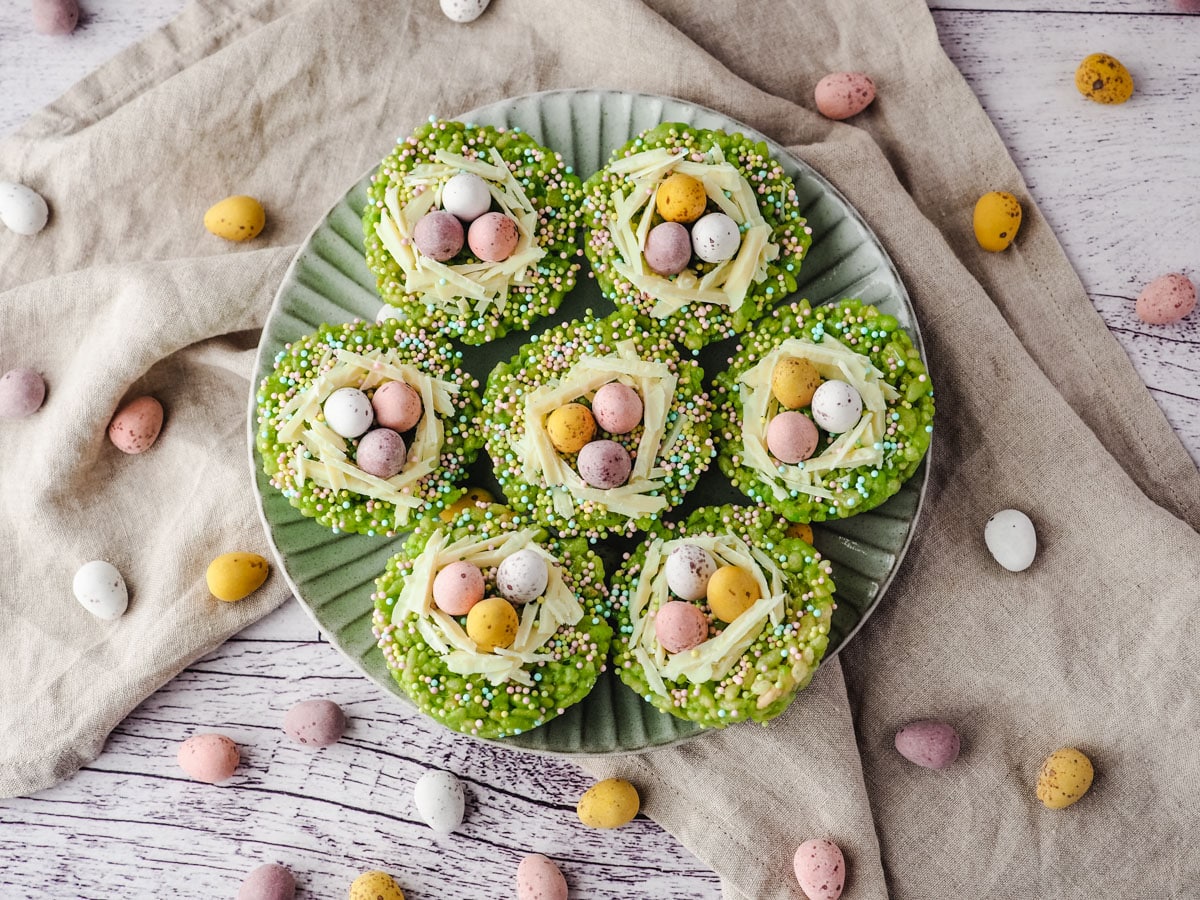 Easter Rice Krispie Treats 9 Rice krispie Easter treats with mini eggs on a plate.