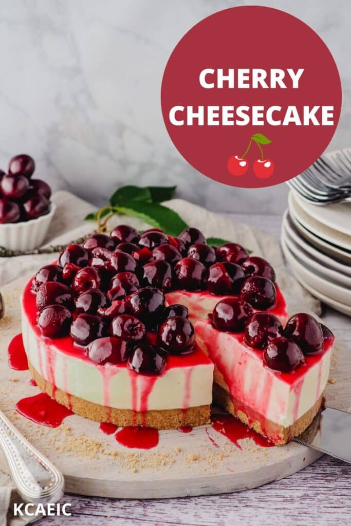 Serving a slice of cherry cheesecake on a serving platter.