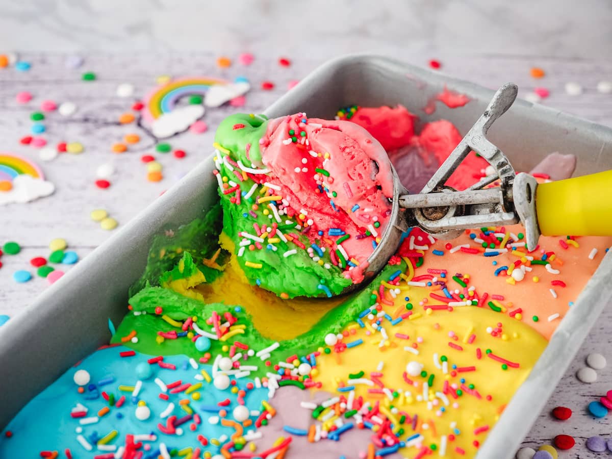 Rainbow Ice Cream 6 Scooping rainbow ice cream.