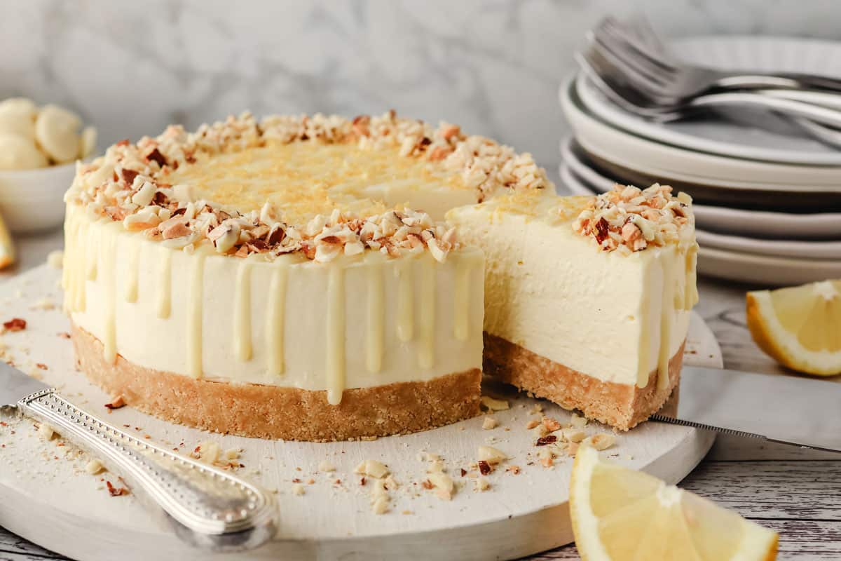 No Bake Cheesecake Recipes 24 Serving a slice of lemon and white chocolate cheesecake.