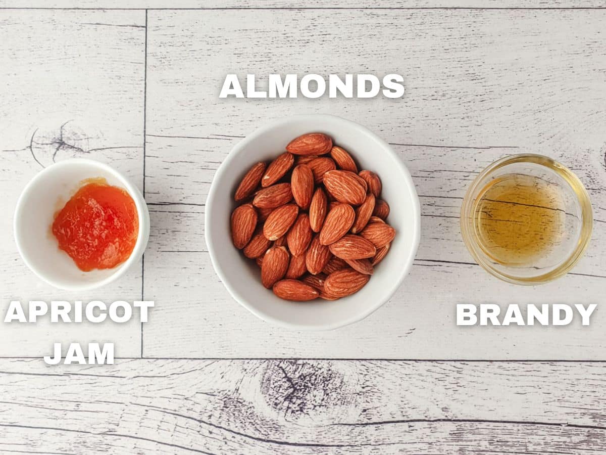 Decorating ingredients: apricot jam, almonds, brandy.